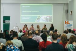 An audience watching a panel of speakers under a slide titled Infrastructure fit for the future